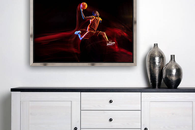 one jump before winning african american young basketball player red team action neon lights dark studio background concept sport movement energy dynamic healthy lifestyle by GrapyArt