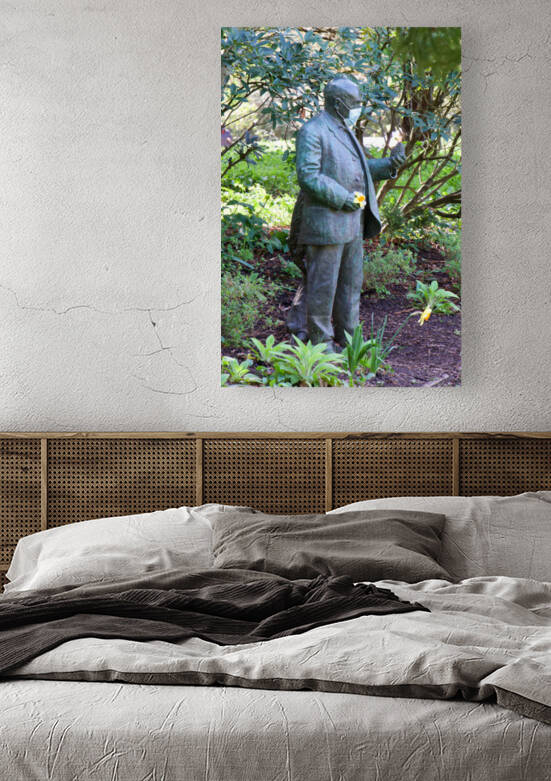 Statues wearing masks by Bill Osuch