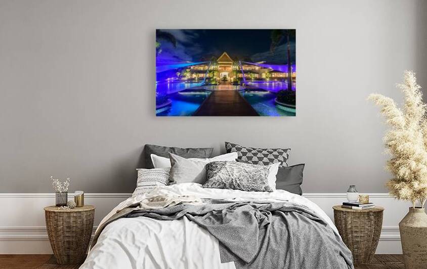 Resort pools at night by Justin Richard Batten