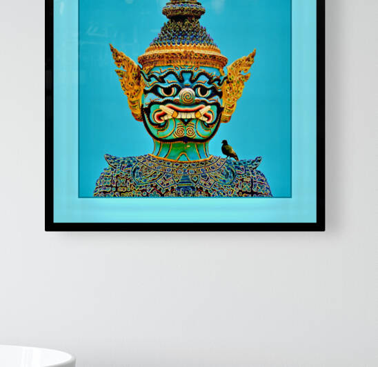 A YAK TEMPLE GUARD WITH A BIRD ON HIS SHOULDER - THAILAND by LES MAYERS 