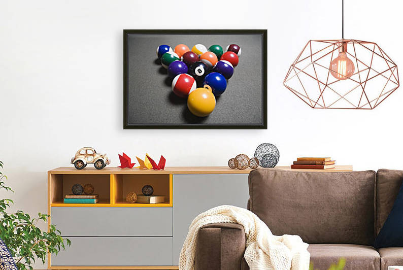 Pool Balls On A Billiard Table With The Eight Ball Facing Upwards by PacificStock