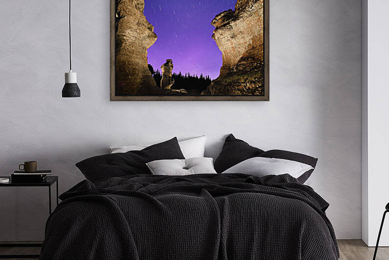 Light painting on monolith and star trails, Anse des Bonnes Femmes at Ile Niapiskau, Mingan Archipelago National Park Reserve of Canada, Cote-Nord, Duplessis region; Quebec, Canada by PacificStock