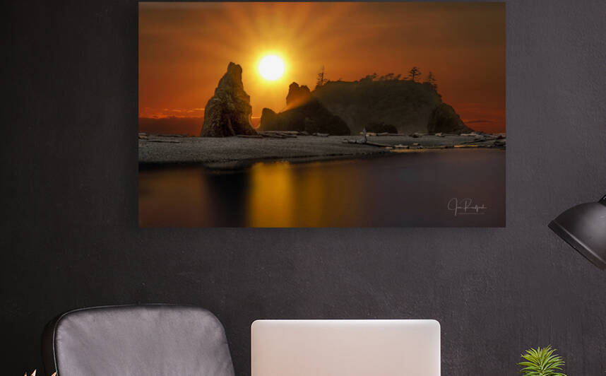 Sun on seastacks by Jim Radford