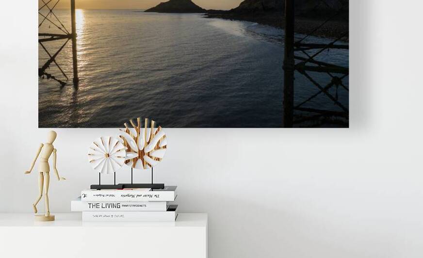 Sunrise at Mumbles lighthouse by Leighton Collins