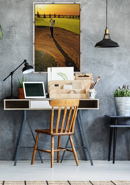 Golfer Taking A Swing From A Golf Bunker by PacificStock