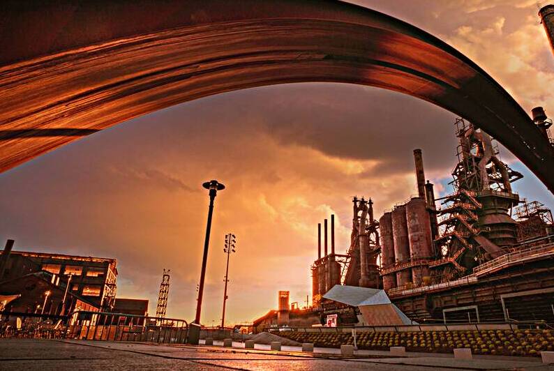Steel Stacks and Stormy Skies Sunset by Jason Fink