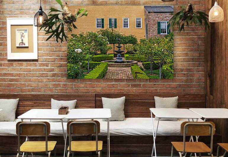 Small tree filled garden in French Quarter of New Orleans by Steve Heap