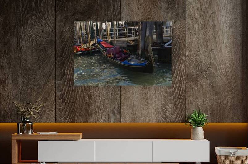 A single gondola in Venice resting for lunch by Iris H Richardson