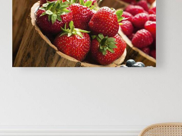 Berries in wooden pots by Assaf Frank