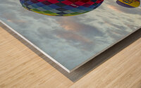 hot air balloons fly over the skies of cappadocia at dawn Wood print