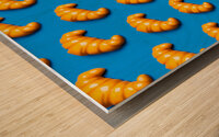 Plastic croissant pattern symbolizes junk food culture critique Wood print