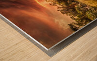 Fiery Sunset Over Tranquil Waters Wood print