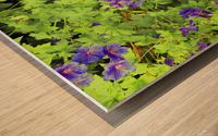 Purple flowers in greenery Wood print