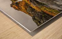 A stream flows past on the West Fjords on its way to the ocean; Iceland Wood print